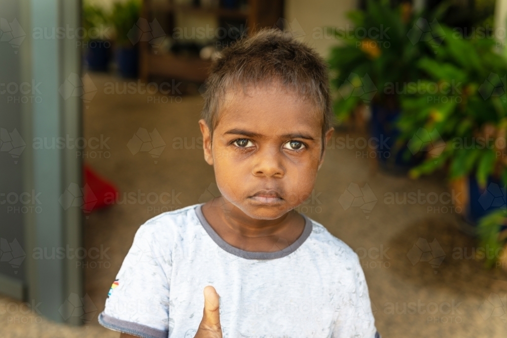 Blurred headshot of preschool aged aboriginal boy - Australian Stock Image