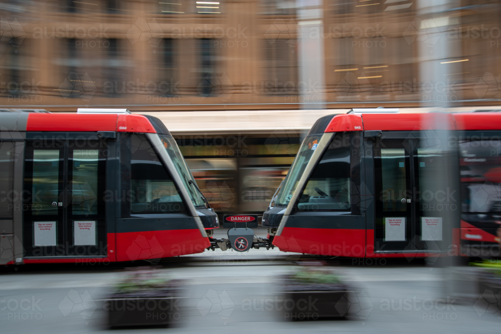 Blurred motion of light rail train on George Street, Sydney - Australian Stock Image