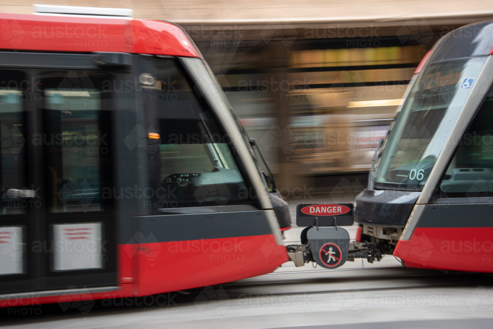 Blurred motion of light rail train on George Street, Sydney - Australian Stock Image