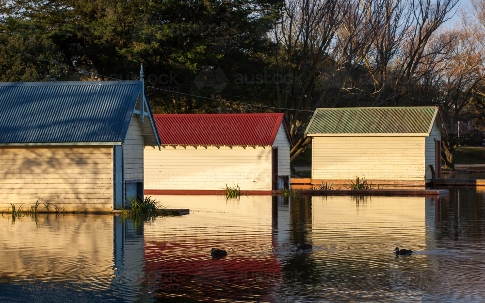 Boatsheds on lake - Australian Stock Image