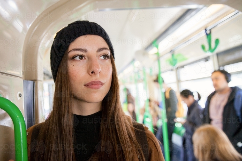 Bored on the Melbourne Tram - Australian Stock Image