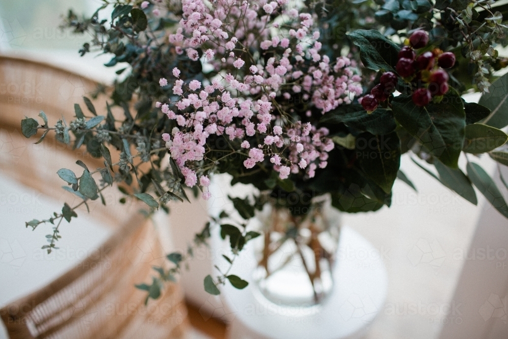 bouquet of flowers sitting on table - Australian Stock Image