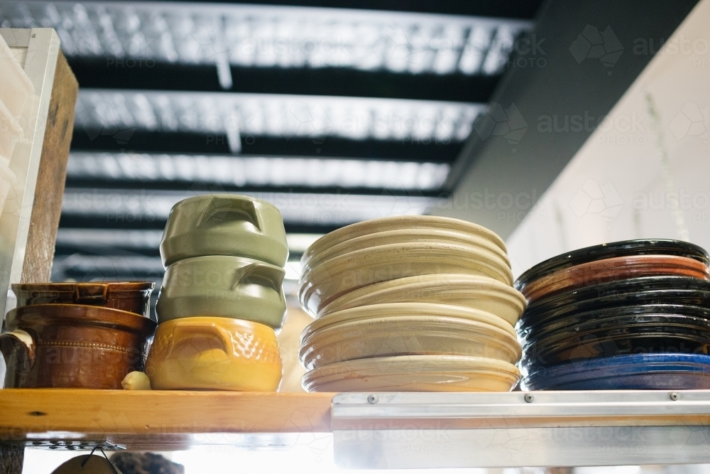 Bowls and plates in stacks - Australian Stock Image