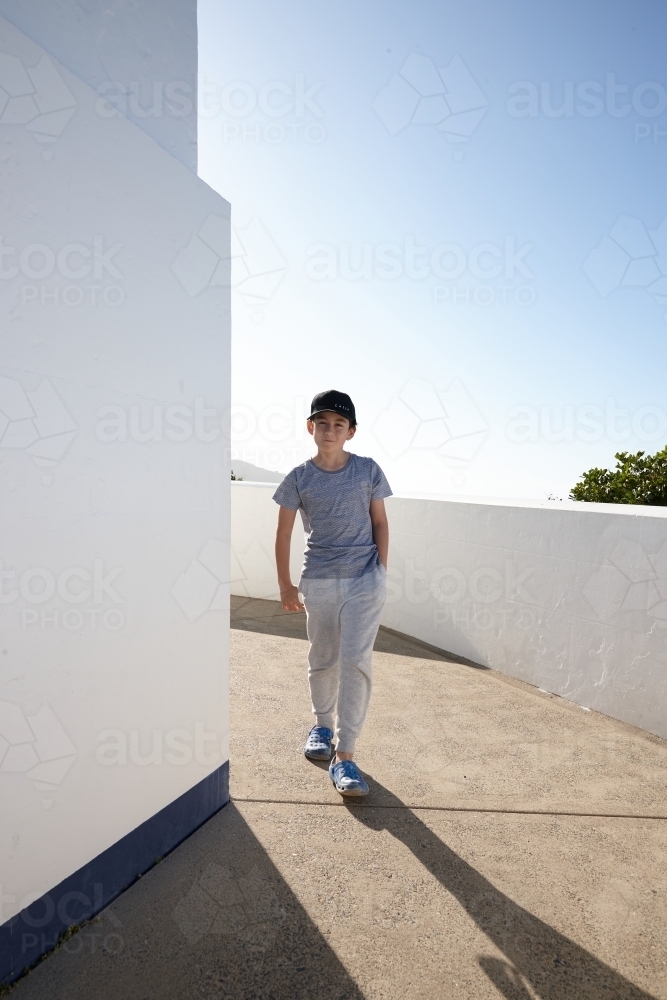 Boy having fun at lighthouse - Australian Stock Image