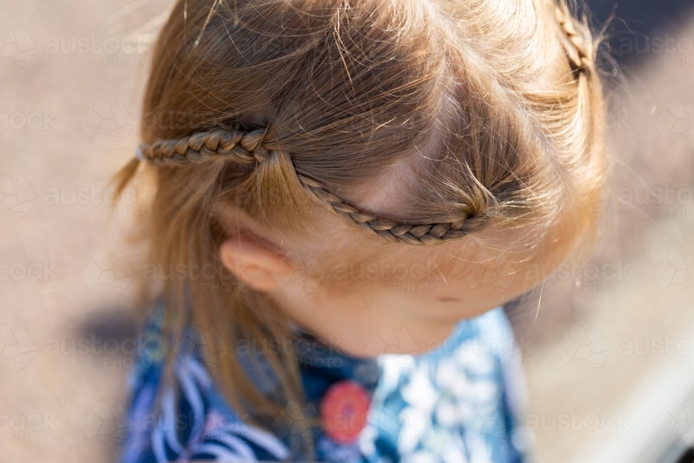 Braids in little girls hair close up - Australian Stock Image