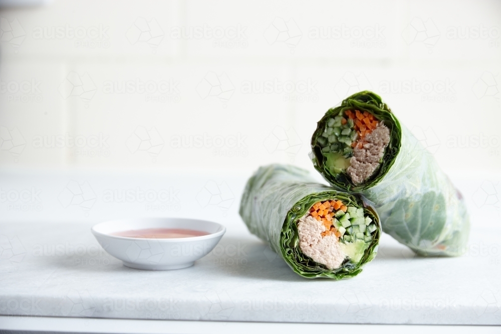 Breakfast burrito in a white plate - Australian Stock Image