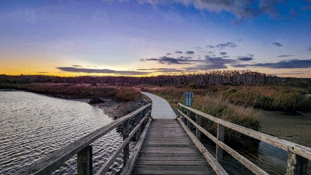 Bridge over Tallow Creek on walking trail near Byron Bay, Australia - Australian Stock Image