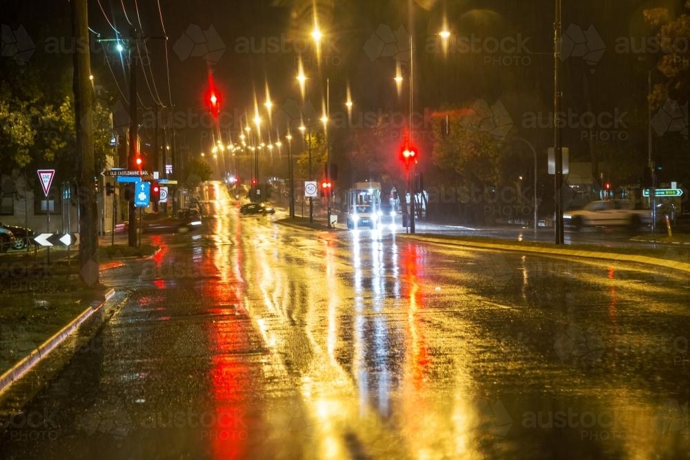 Bright light reflections on a rainy night - Australian Stock Image