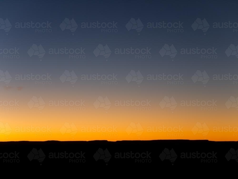Bright orange horizon just after sunset - Australian Stock Image