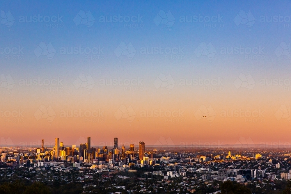 Brisbane city sunset golden light on buildings - Australian Stock Image