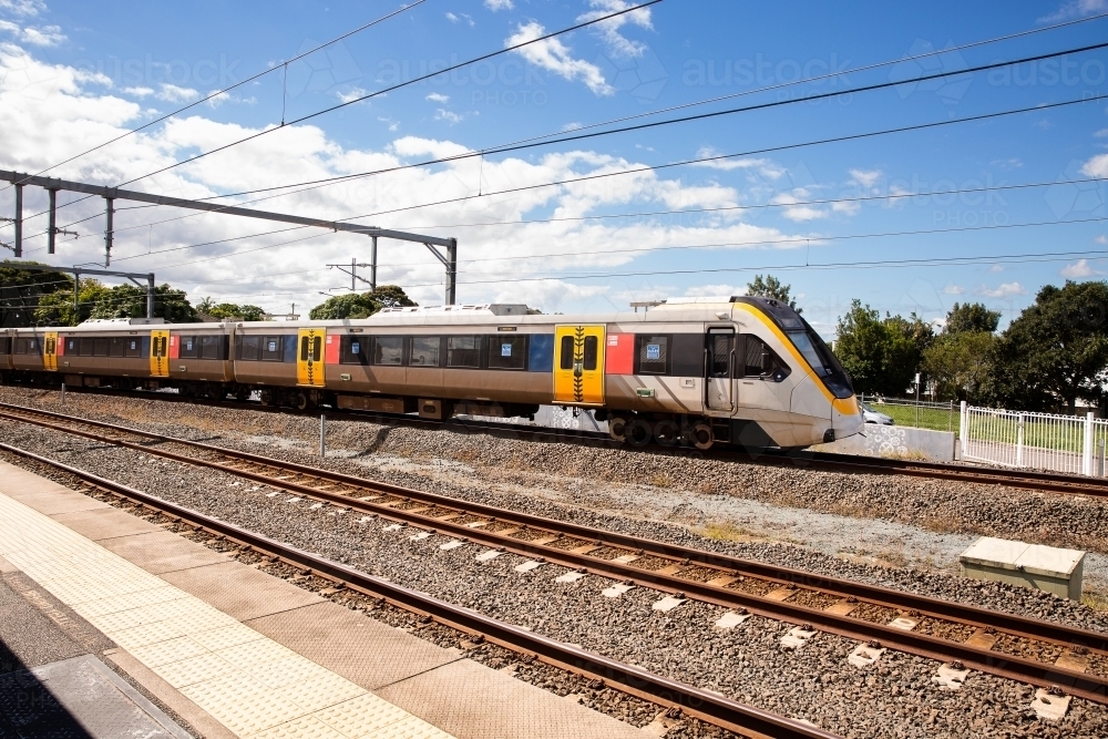 Brisbane Train at a suburban train station - Australian Stock Image