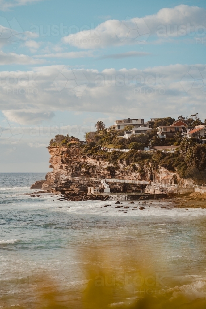 Bronte Ocean Pool (Bronte Baths) and headland on a sunny morning - Australian Stock Image