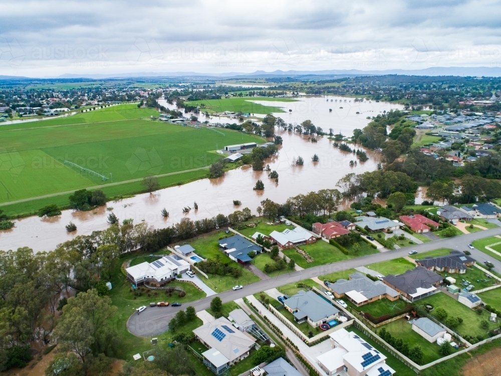 Brown floodwaters of Hunter River in Singleton - Australian Stock Image