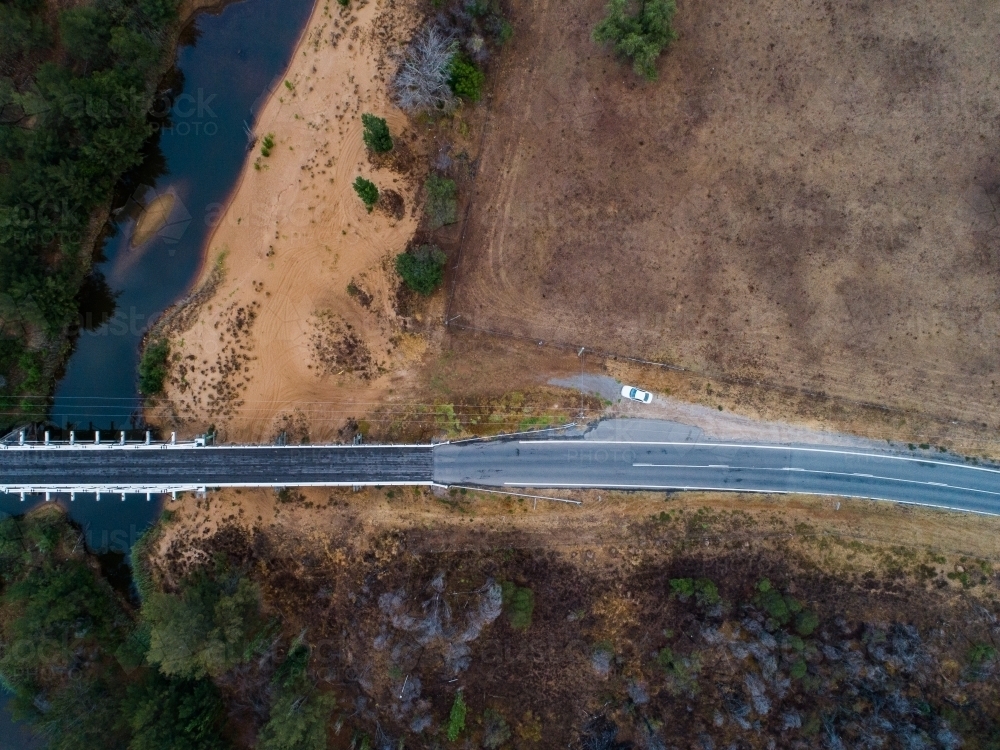 Bulga bridge over stagnant creek on overcast day - Australian Stock Image