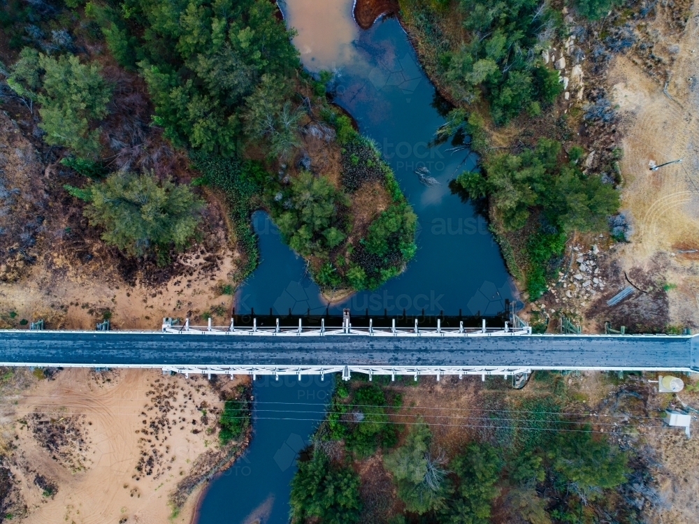 Bulga bridge over stagnant creek on overcast day - Australian Stock Image