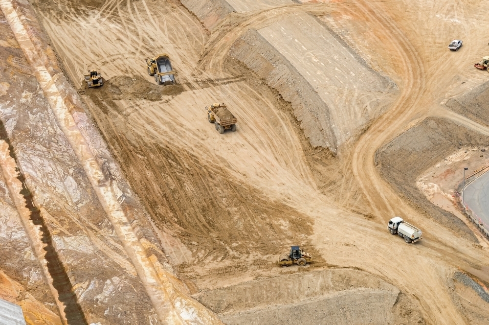 Bulldozers doing earth work on industrial construction site, Curtis Island, Queensland - Australian Stock Image