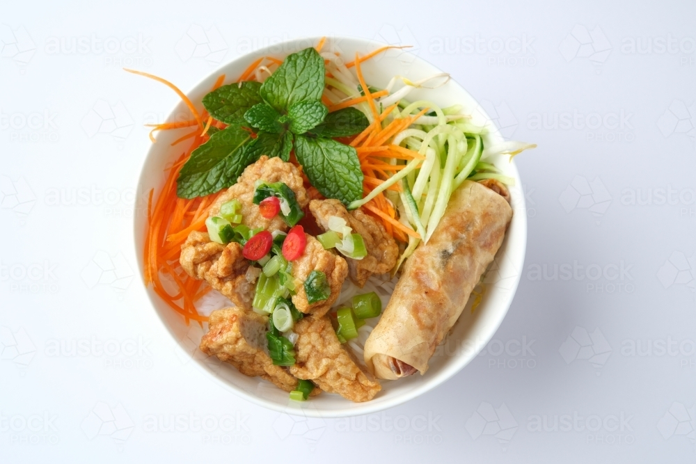 Bun Cha Gio bowl topped with fried spring roll and Cha Lua. - Australian Stock Image