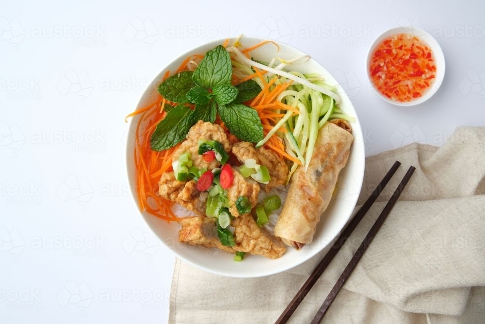 Bun Cha Gio bowl topped with fried spring roll and Cha Lua. - Australian Stock Image