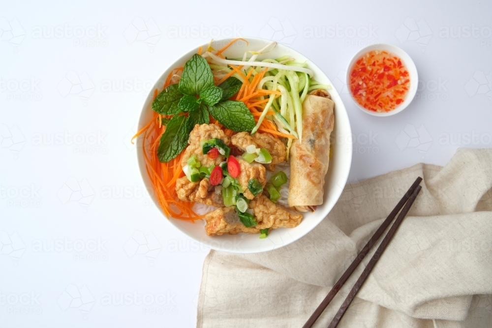 Bun Cha Gio bowl topped with fried spring roll and Cha Lua. - Australian Stock Image