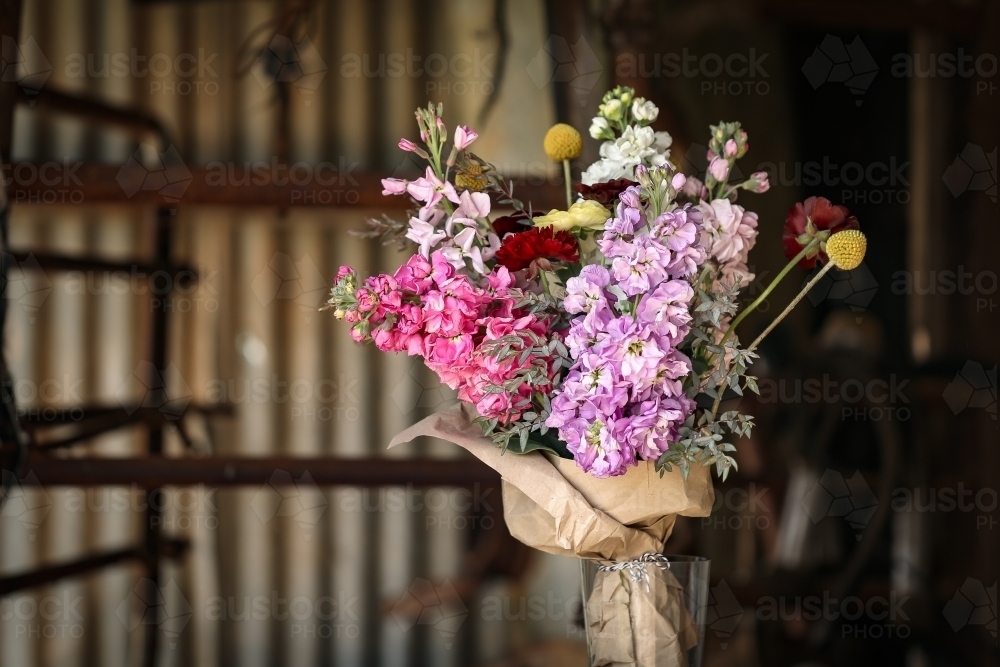 Bunch of cottage cut flowers in rustic country setting - Australian Stock Image