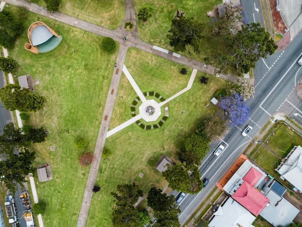 Burdekin Park cenotaph with remembrance day wreaths laid around it seen from aerial view - Australian Stock Image