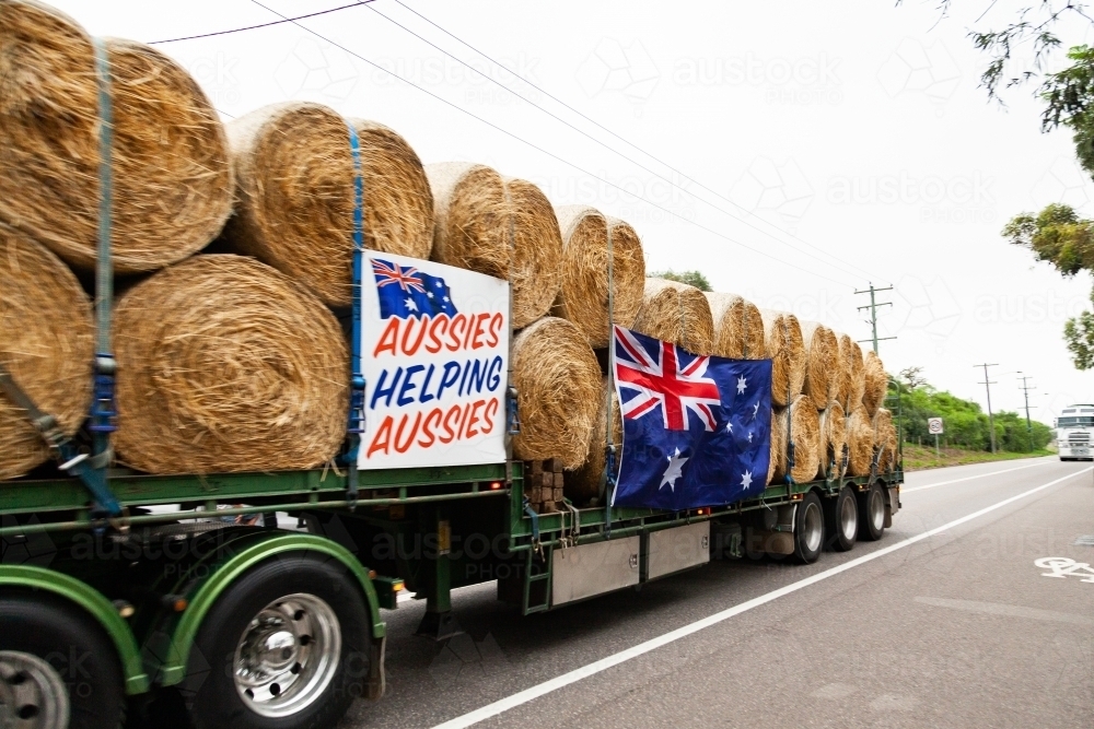 Burrumbuttock Hay Runners going through Singleton on their way to assist farmers - Australian Stock Image