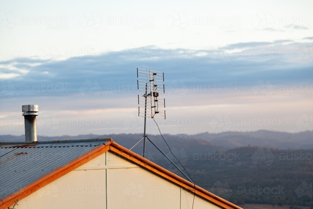 Cabin accommodation in hills at dawn - Australian Stock Image