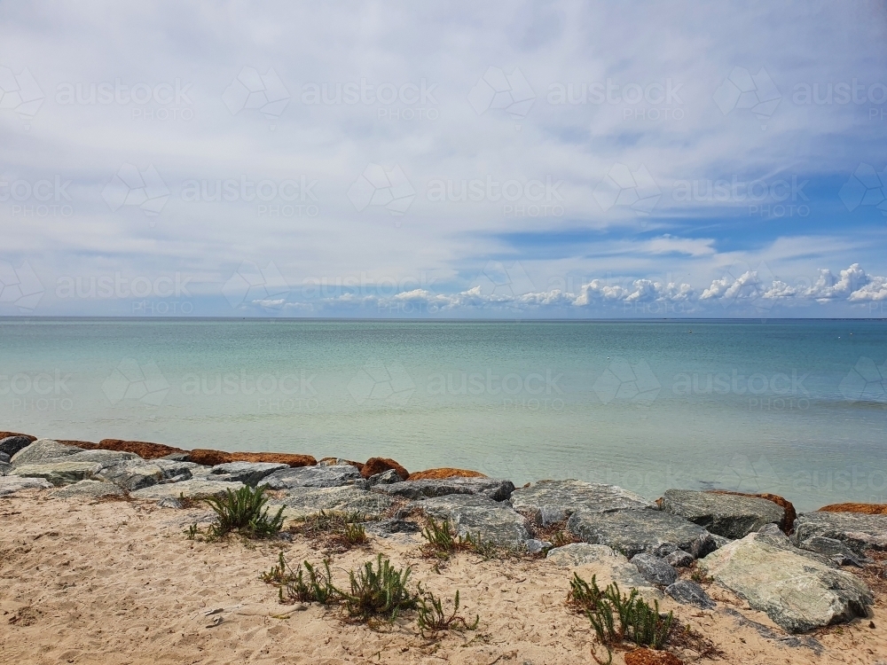 Calm beach with rocks - Australian Stock Image