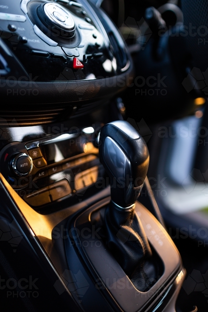 car dashboard with buttons and stick for automatic vehicle - Australian Stock Image