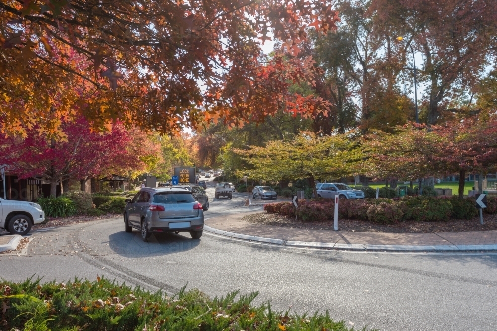 car driving around roundabout - Australian Stock Image