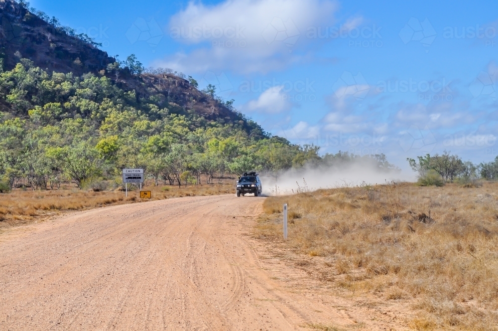 Car on an outback dirt road - Australian Stock Image