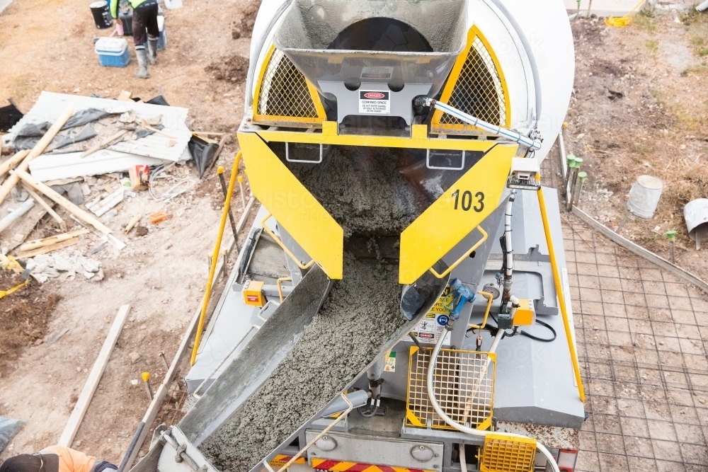 cement pouring out of a cement truck - Australian Stock Image