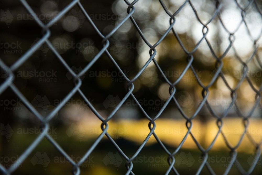 chain link fence squares at a football club - Australian Stock Image