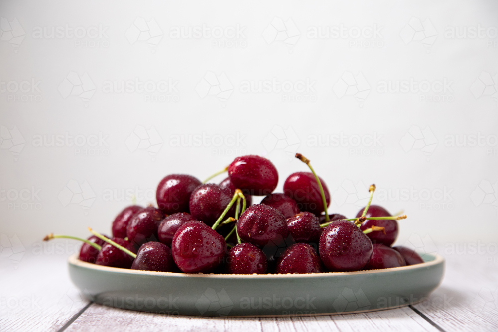 Cherries on a plate - Australian Stock Image