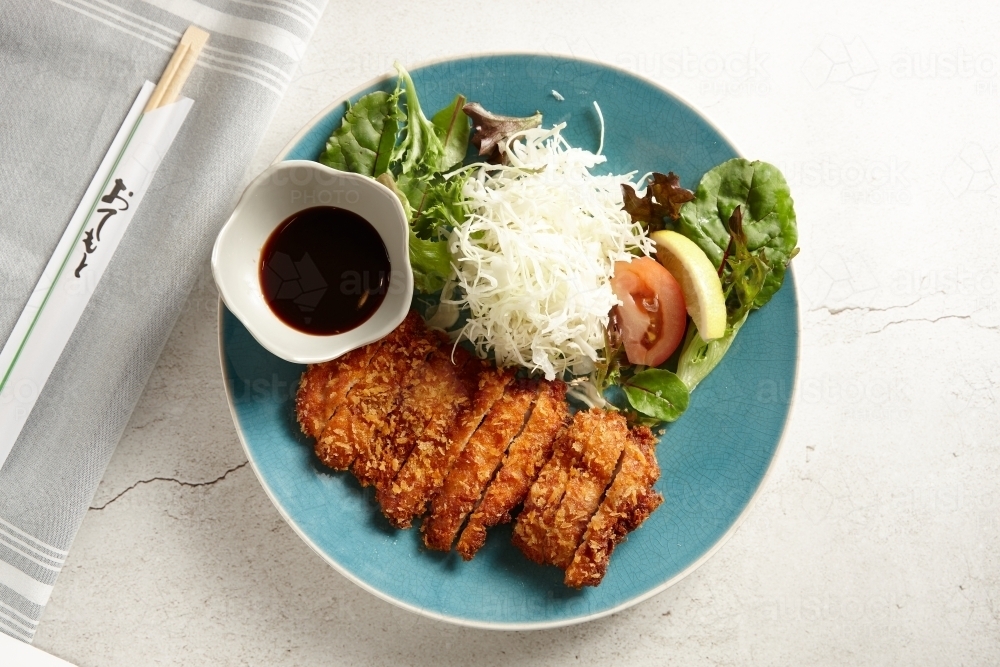 Chicken katsu with salad - Australian Stock Image