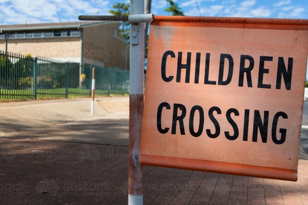 Children crossing sign at a school - Australian Stock Image