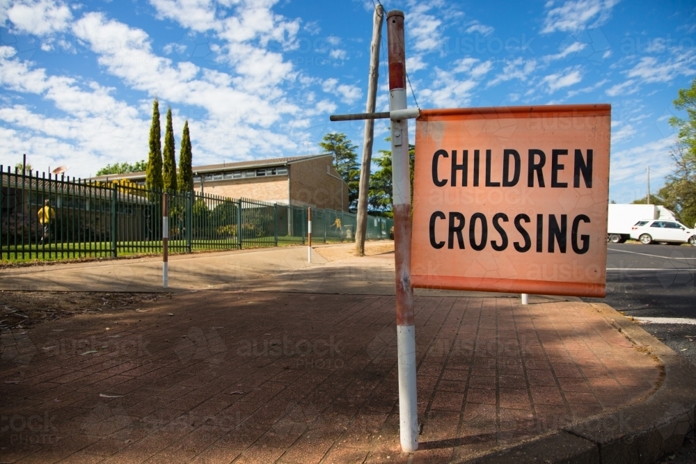 Children crossing sign at a school - Australian Stock Image