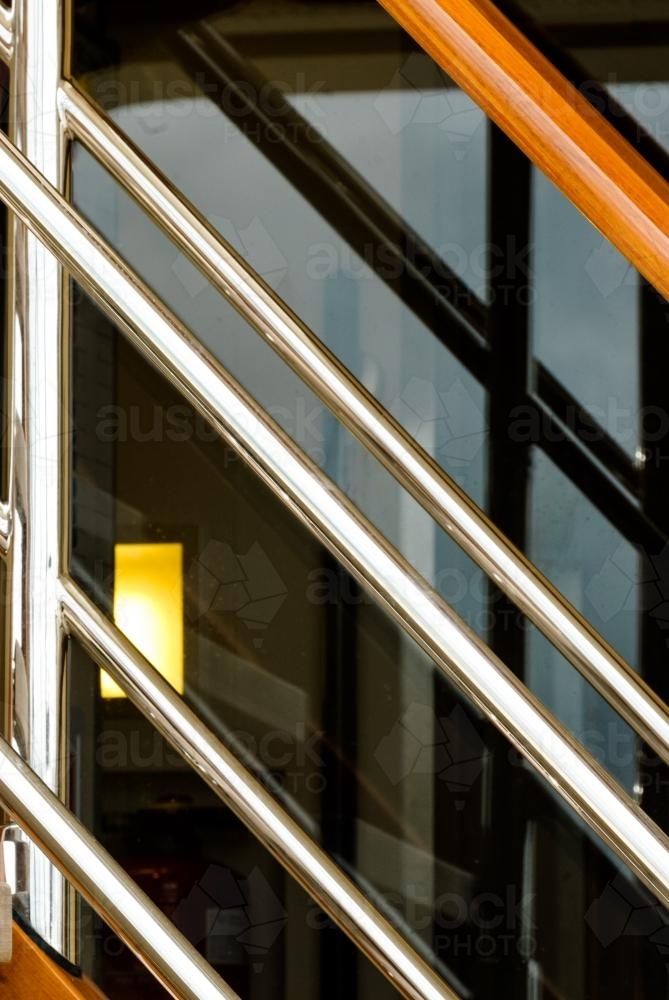 Close up abstract of part of a boat with diagonals and reflections - Australian Stock Image