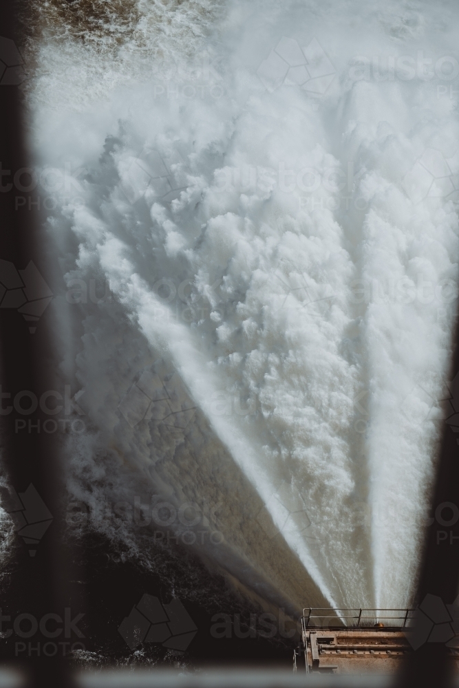 Close up detail of Water flowing from the Hume Dam wall into the Murray River. - Australian Stock Image