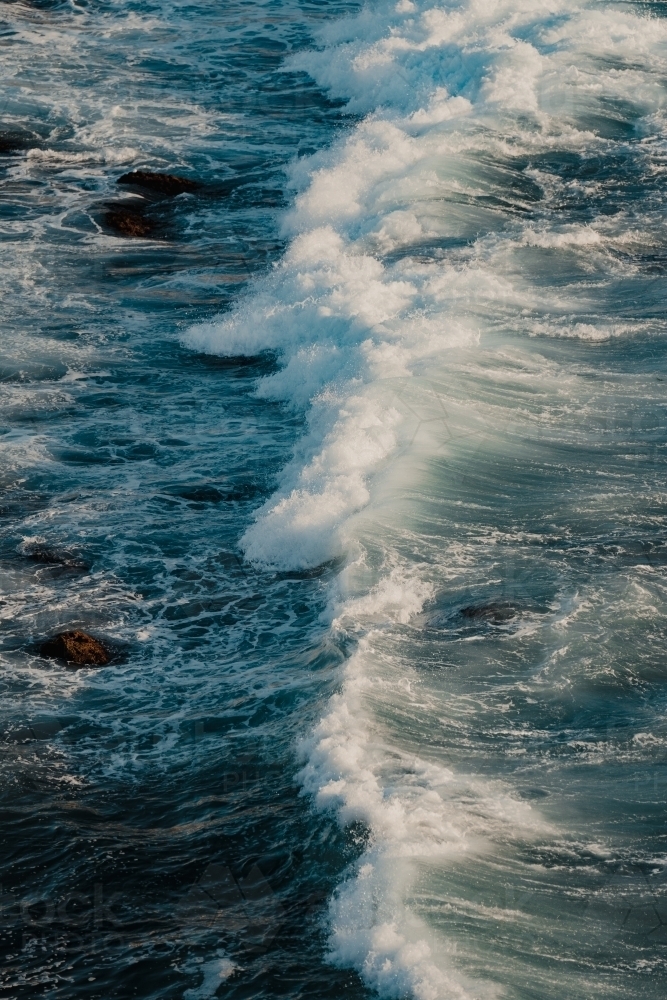 Close up of a wave breaking at Bronte Beach - Australian Stock Image