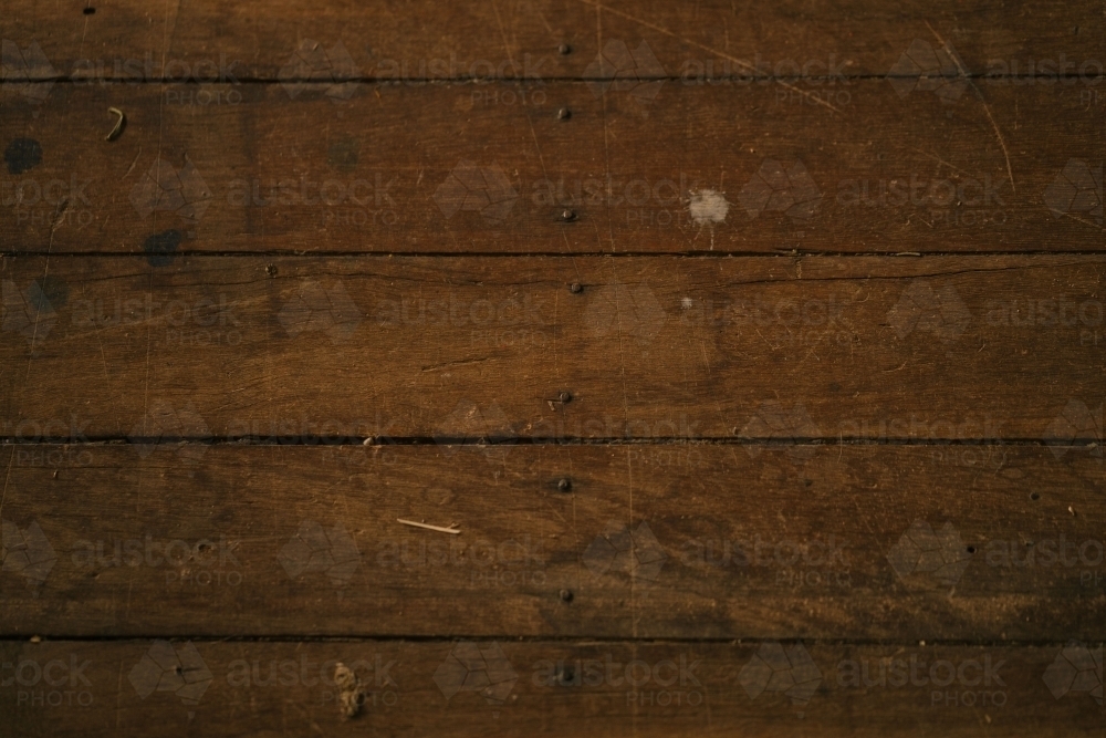 Close-up of a wooden surface with visible grain patterns - Australian Stock Image