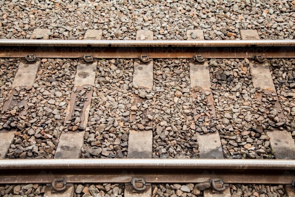 Close up of brown train track and gravel - Australian Stock Image