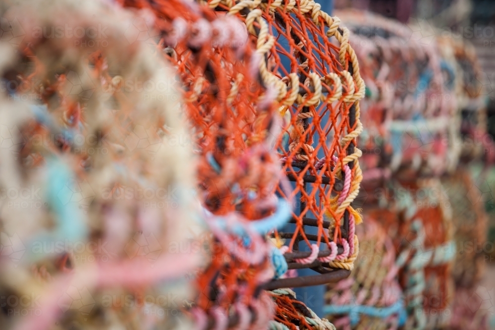 close up of cray pots on a wharf in a coastal town - Australian Stock Image