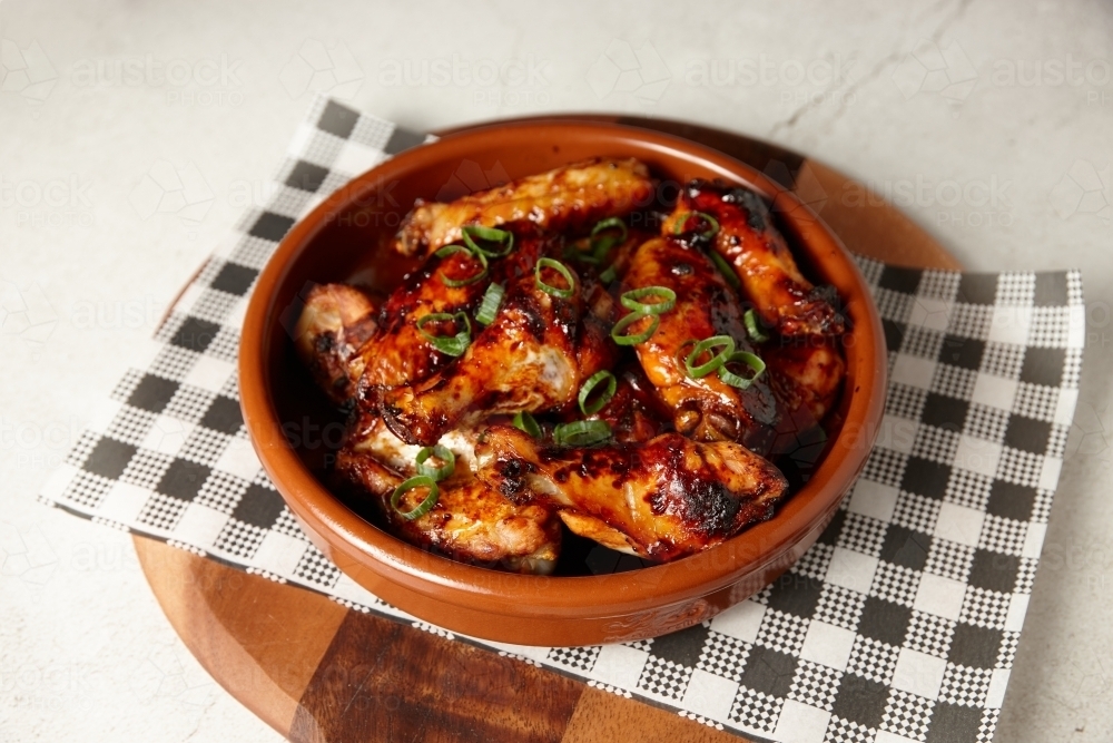 Close up of crispy chicken wings - Australian Stock Image