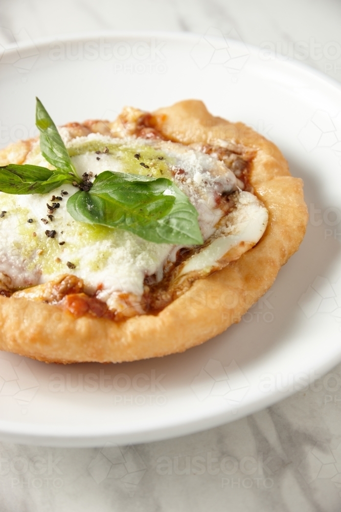 Close up of gourmet Italian cheesy bread dish - Australian Stock Image