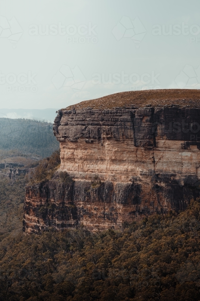 Close up of rocky cliff face view from Kanangra Walls Lookout on a sunny day - Australian Stock Image