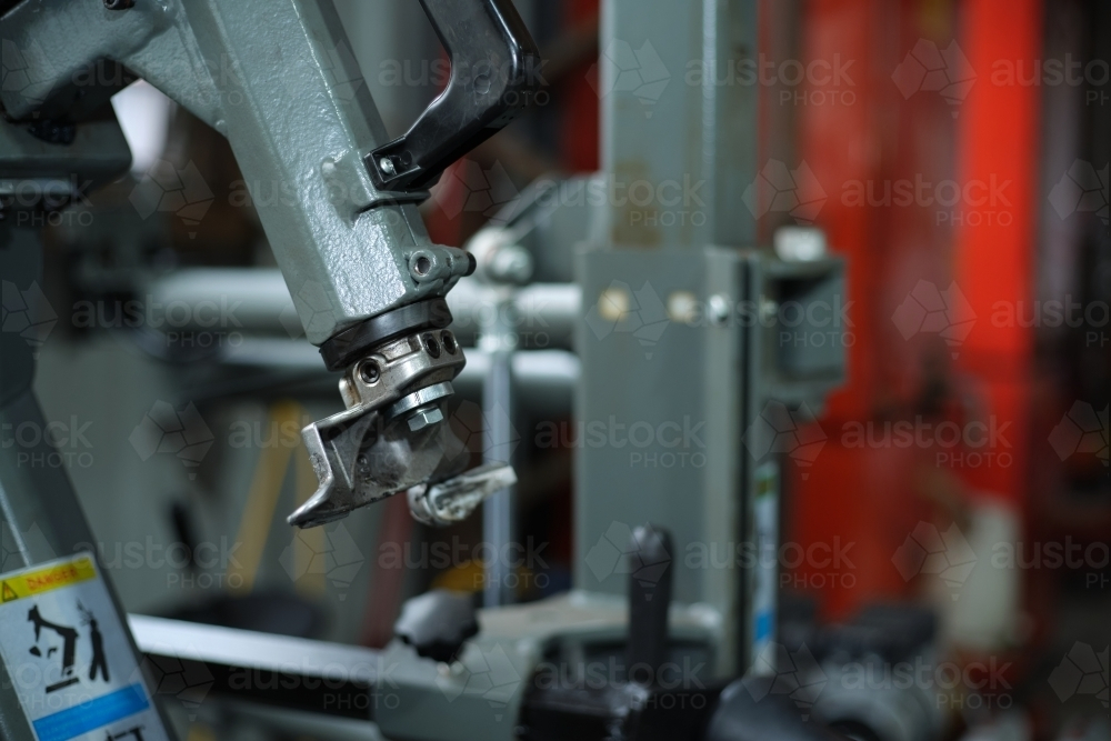 Close-up of tire changer machine - Australian Stock Image
