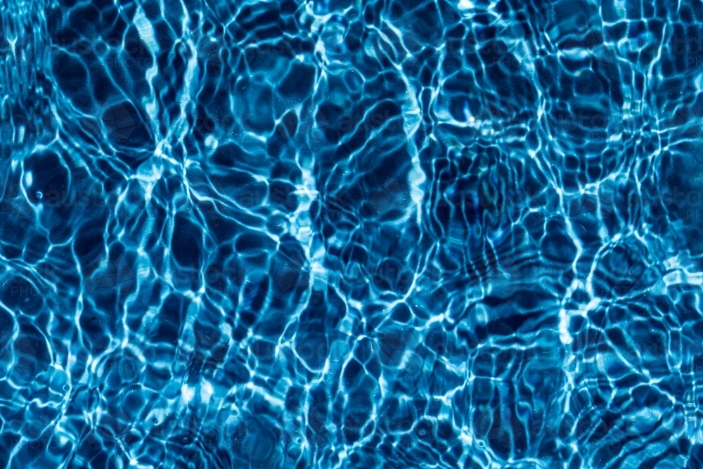 Close-up reflection of light on water surface - Australian Stock Image