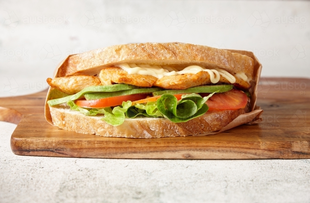 close up shot of chicken-avocado-jumbo-sandwich- - Australian Stock Image