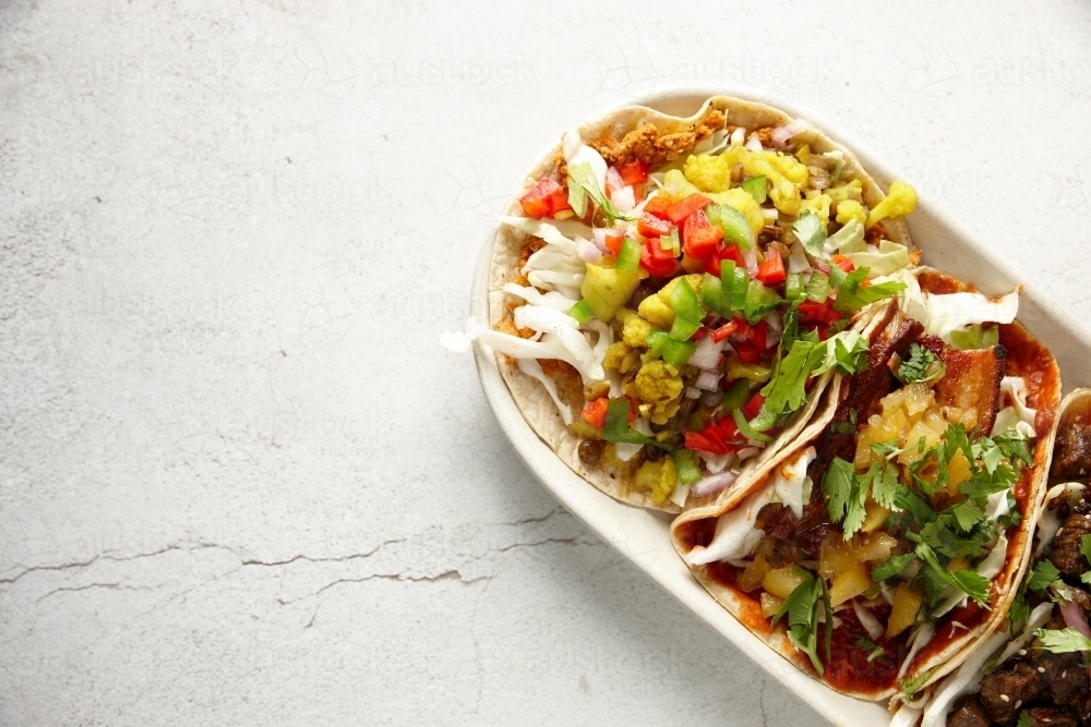 Image of close up shot of tacos - Austockphoto